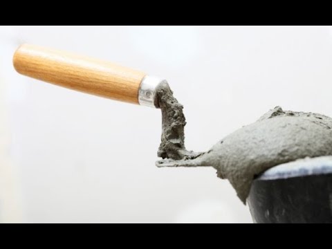 Como preparar cemento para reparar una pared